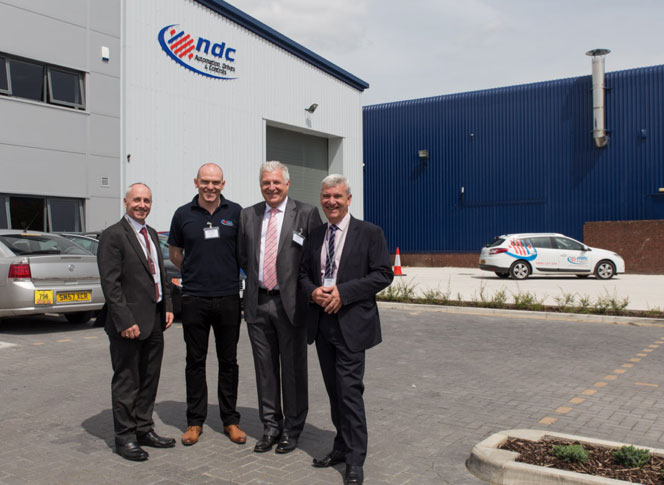 Photo: Pictured outside the new building, L to R Trevor Hughes, Jordan Griffin, David Griffin and John Hughes.